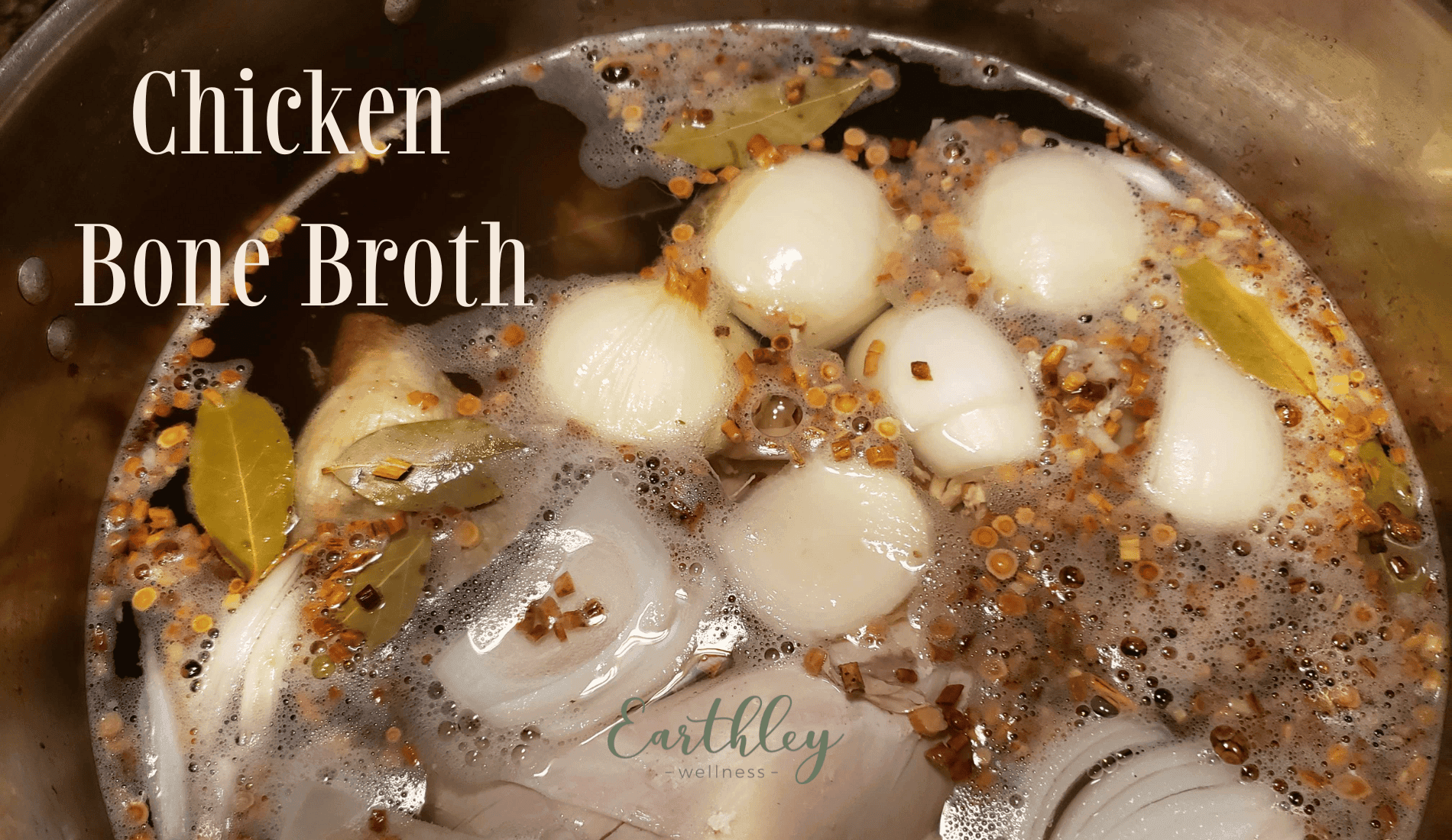 Chicken Bone Broth recipe header showing golden yellow broth simmering in silver stainless steel pot with white onions and bay leaves floating on surface