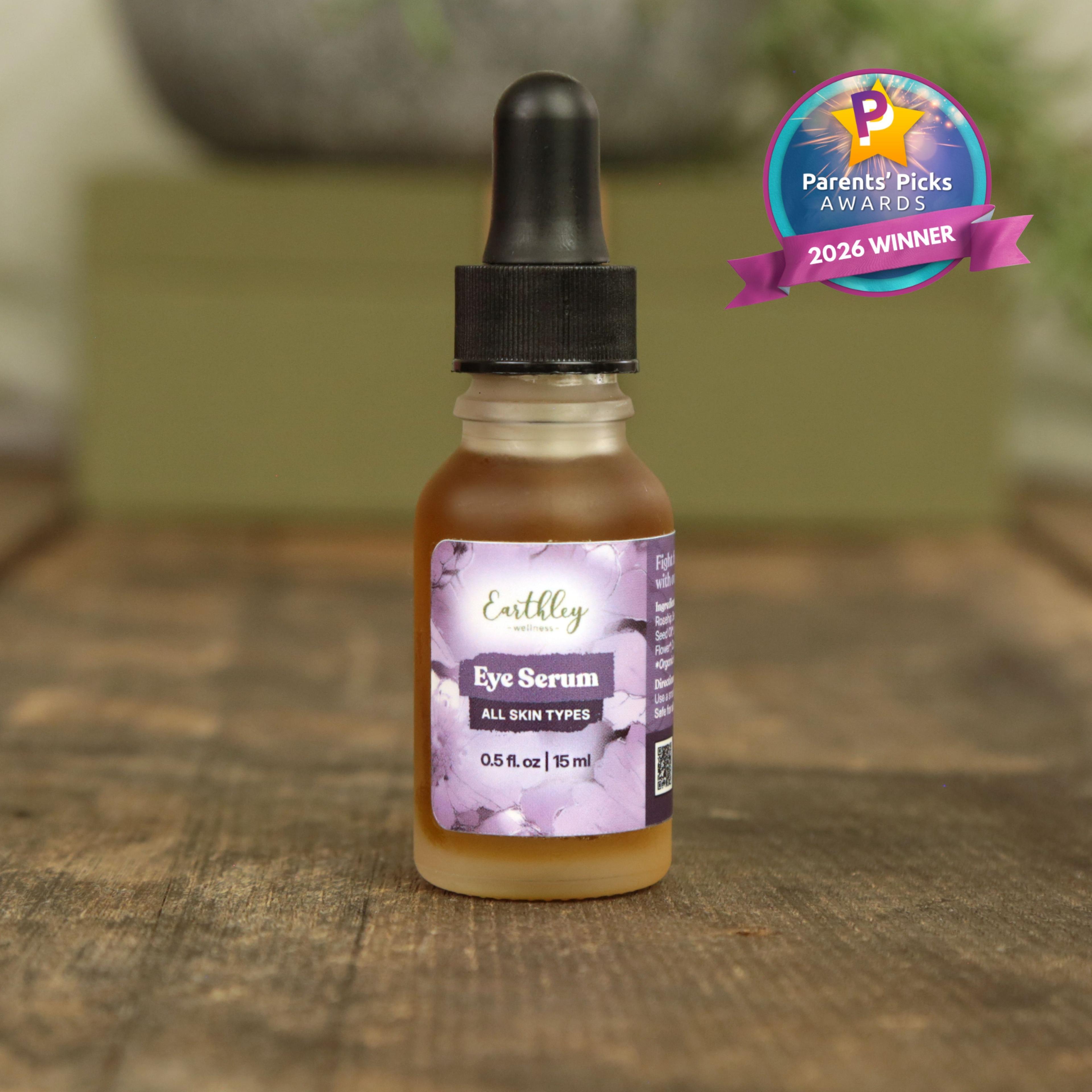 Earthley Eye Serum bottle with dropper on wooden surface, featuring Parents' Picks Awards 2026 Winner badge