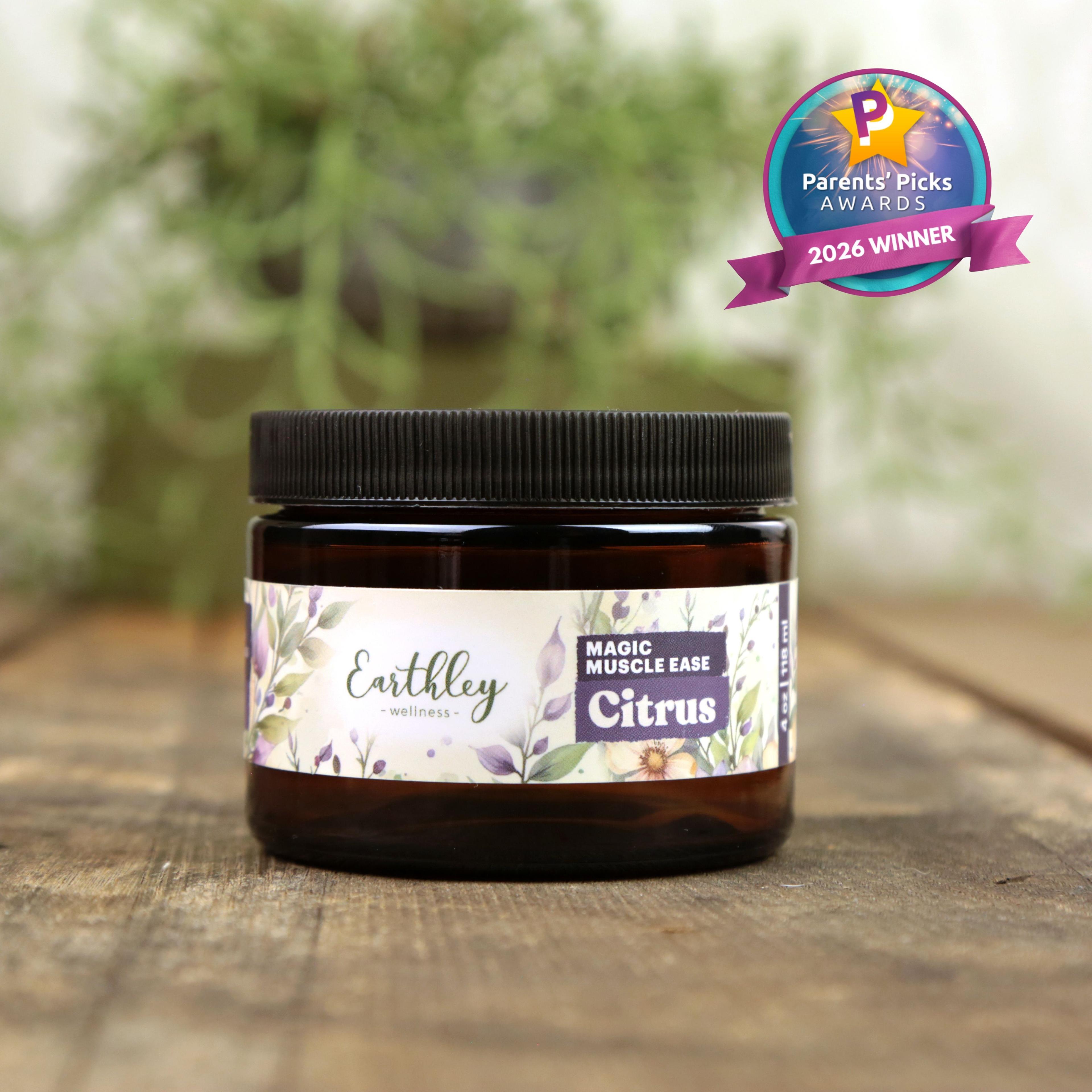Earthley Magic Muscle Ease Citrus salve jar with floral label and Parents' Picks Awards 2026 Winner badge