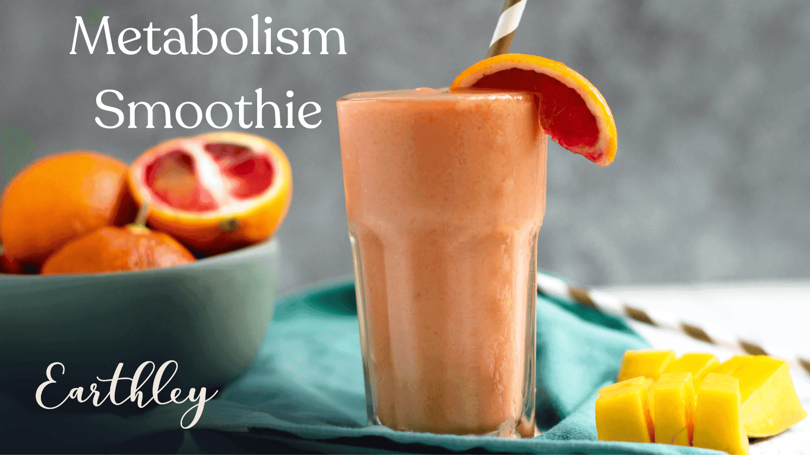 Metabolism Smoothie blog header showing tall glass of peach-orange smoothie with green straw, blood orange slice garnish, and mango chunks with teal background, Earthley Wellness logo