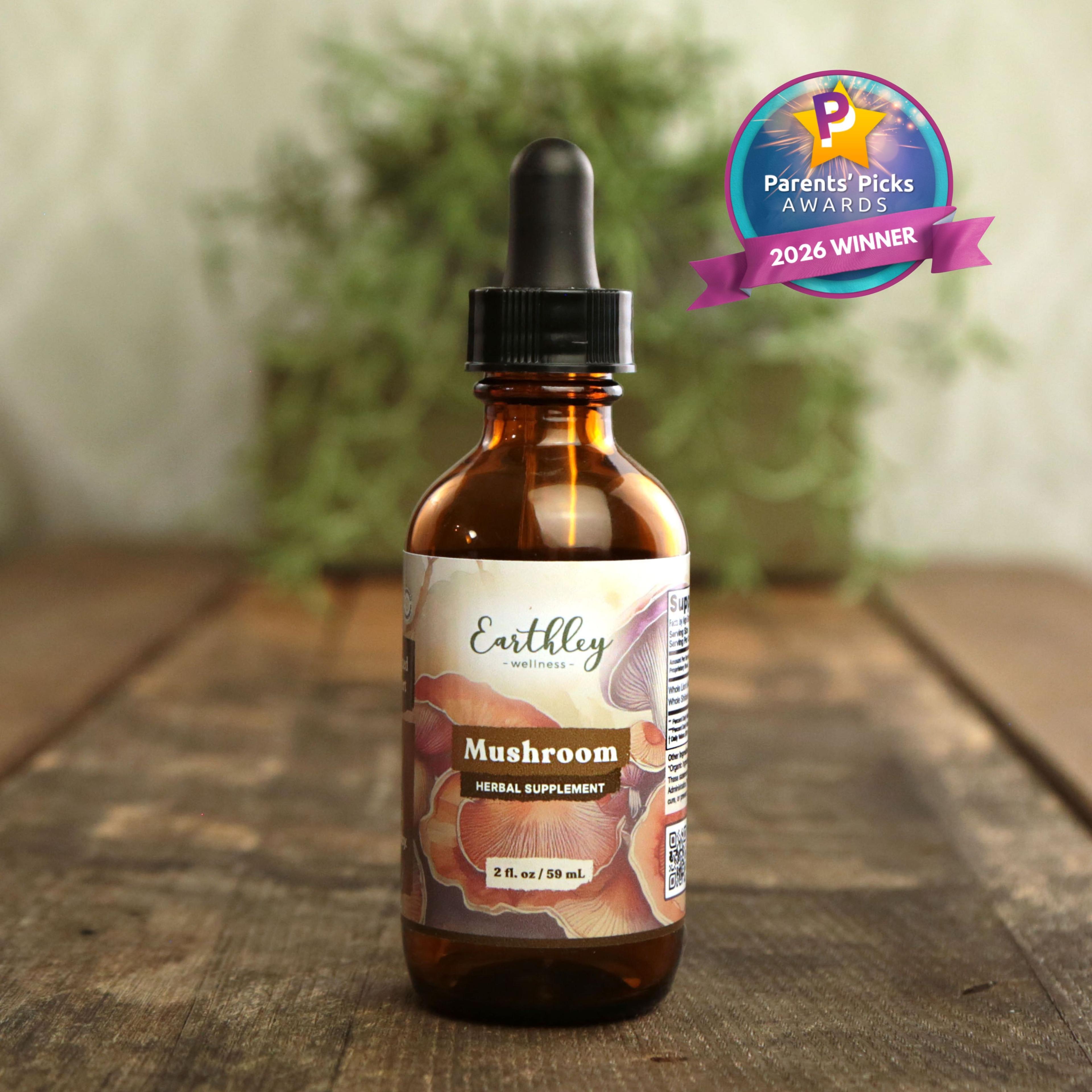 Earthley Wellness Mushroom herbal supplement tincture bottle with dropper and Parents' Picks 2026 Winner award badge