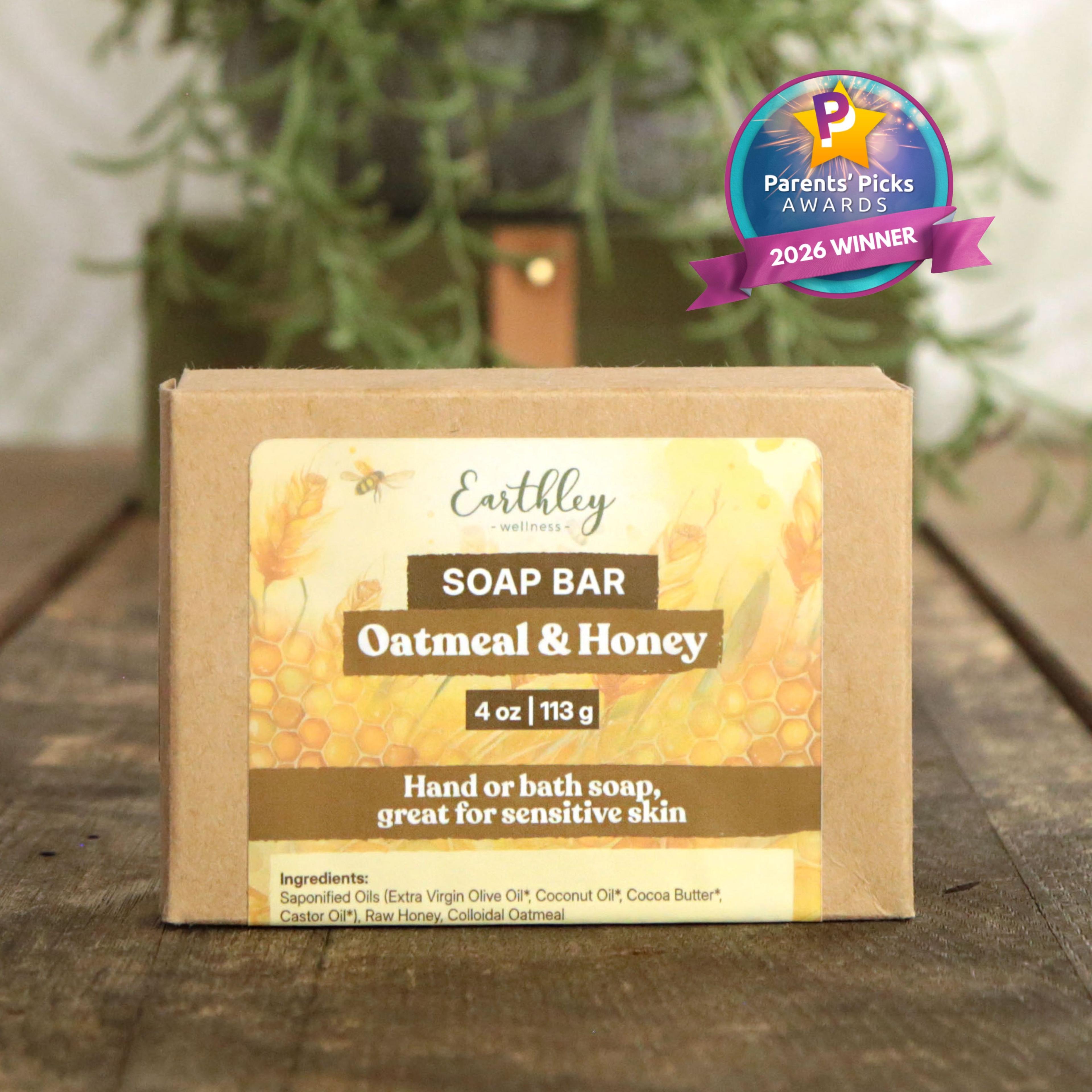 Earthley Oatmeal & Honey soap bar packaging with Parents' Picks Awards 2026 Winner badge on wooden surface