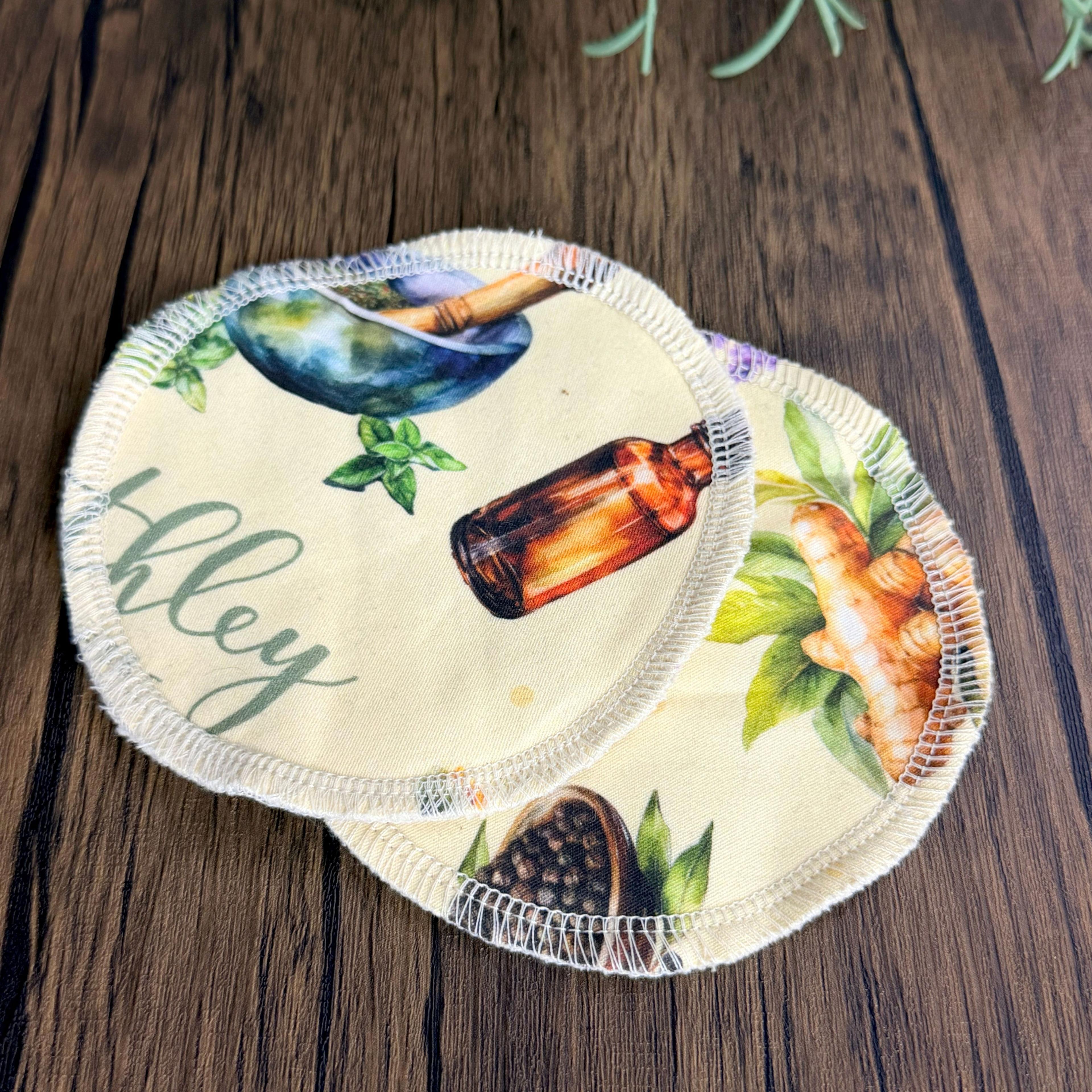 Reusable cotton rounds with herbal apothecary print featuring tincture bottle and ginger root