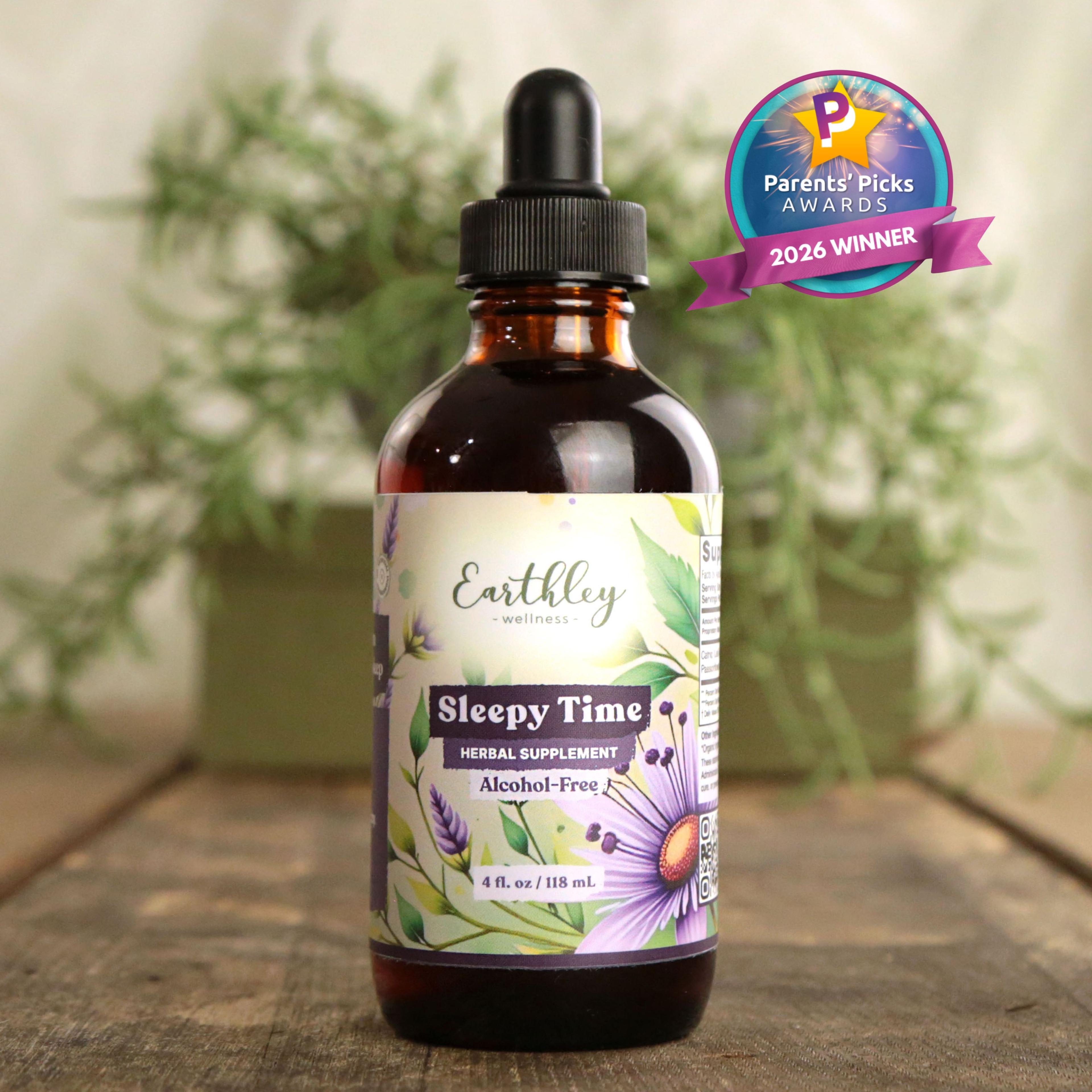 Earthley Sleepy Time alcohol-free herbal tincture bottle with dropper, featuring floral label design and Parents' Picks Award badge