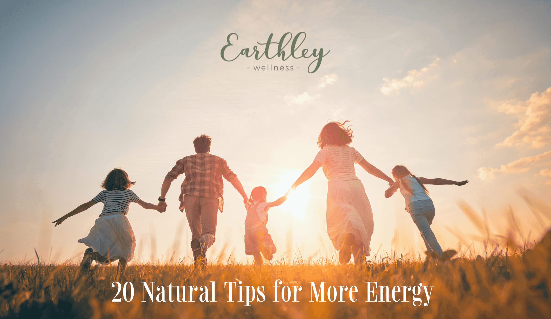 20 Natural Tips for More Energy blog header showing family of four running through golden field at sunset