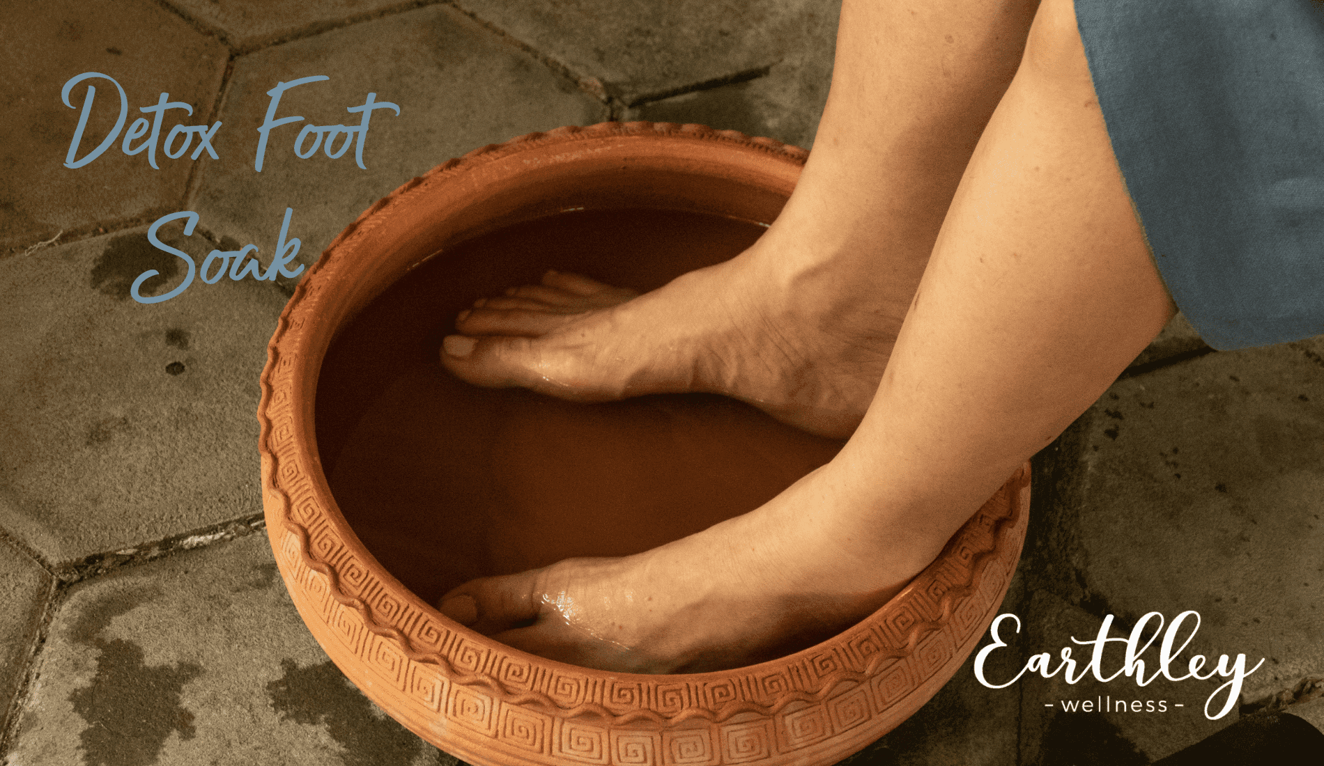 Detox Foot Soak recipe showing feet soaking in terra cotta brown clay bowl on gray slate tile floor