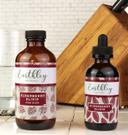 Elderberry Elixir For Kids 8oz bottle and adult dropper bottle with burgundy leaf labels and wooden cutting board