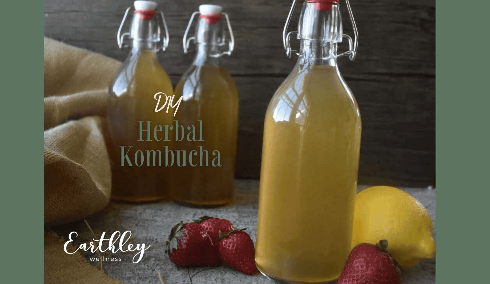 DIY Herbal Kombucha recipe header showing golden yellow kombucha in glass swing-top bottles with red strawberries and yellow lemon on tan burlap cloth background