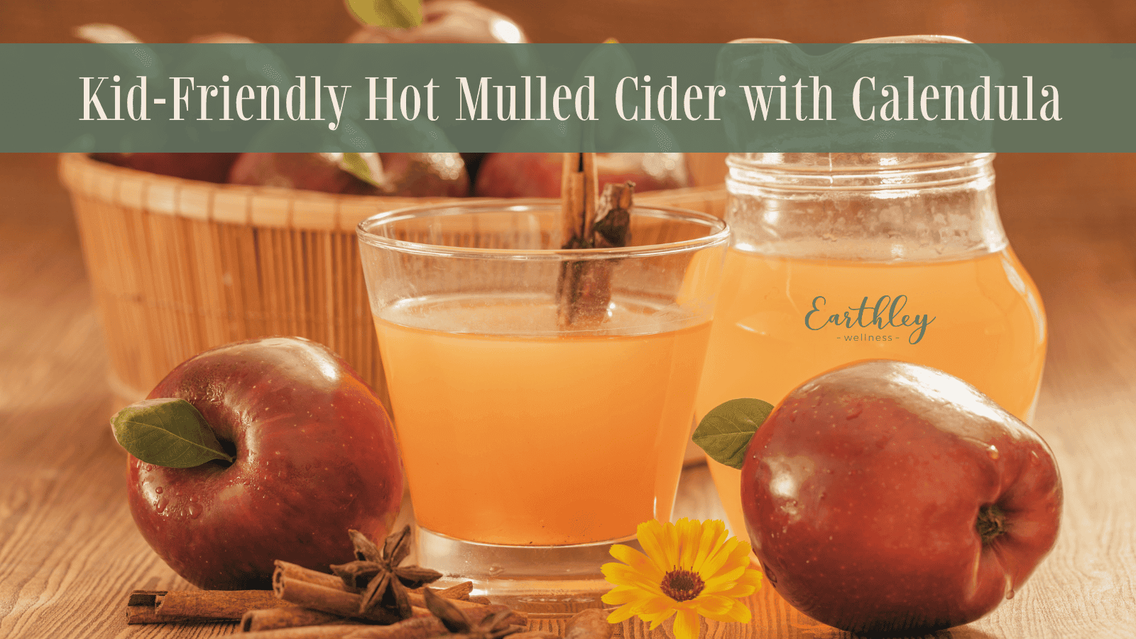 Kid-Friendly Hot Mulled Cider with Calendula recipe header showing amber cider in glass mason jars with red apples cinnamon sticks and orange calendula flower on tan background