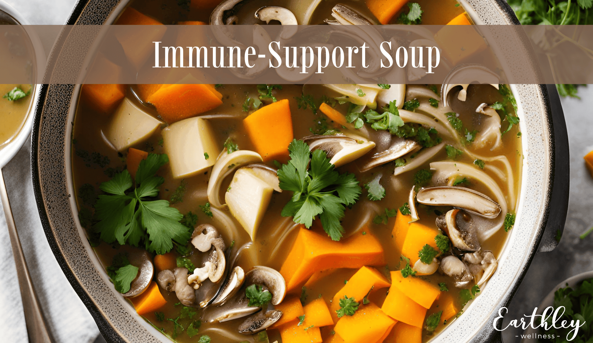 Immune Support Soup recipe header showing large silver pot filled with golden broth orange butternut squash cubes brown sliced mushrooms and tofu chunks garnished with fresh green parsley
