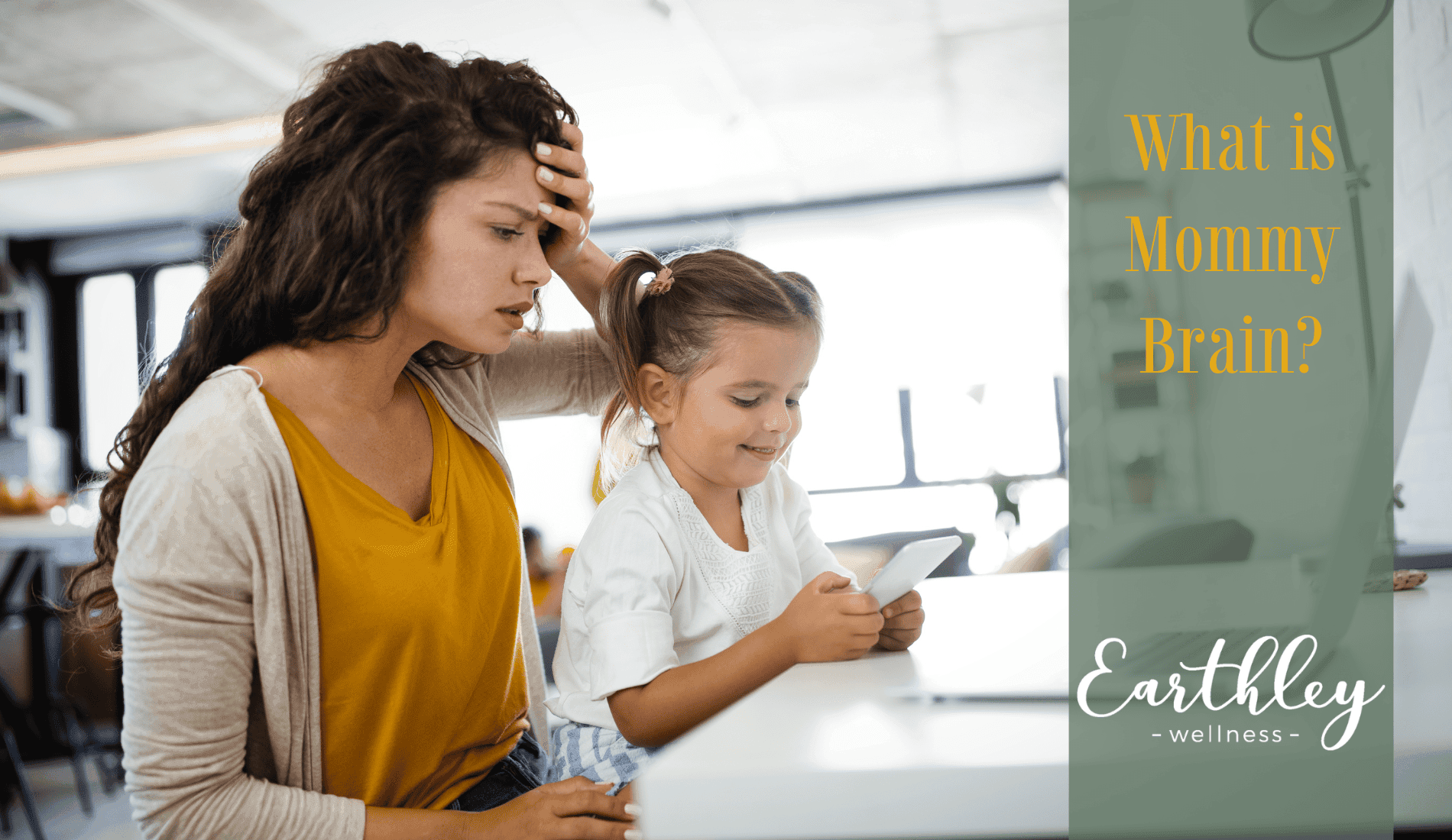 What is Mommy Brain blog header showing mother with curly dark hair in mustard yellow top looking stressed while holding phone with young daughter with brown pigtails looking at screen in bright kitchen