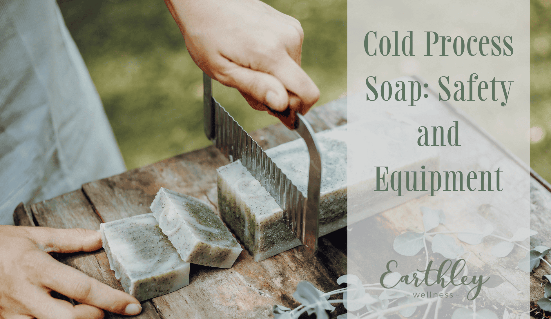 Cold Process Soap Safety and Equipment blog header showing hands in work gloves handling gray rectangular soap bars in metal wire curing rack outdoors